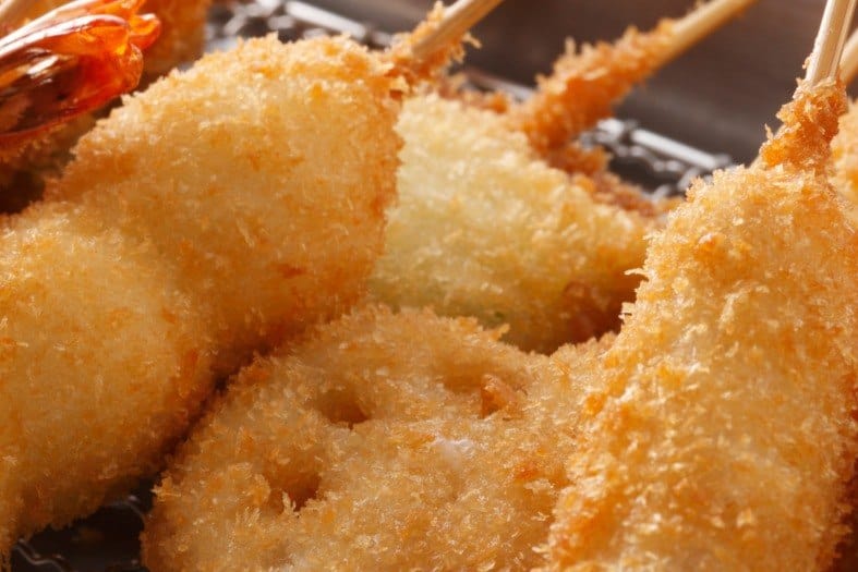 street food in Osaka, some sort of meat on a stick