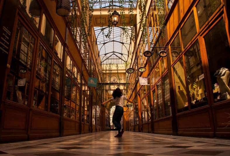a teenage girl shopping in paris