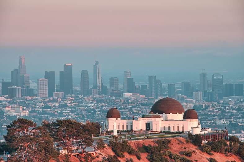 the Griffith Observatory sitting high on a hill overlook Los Angeles