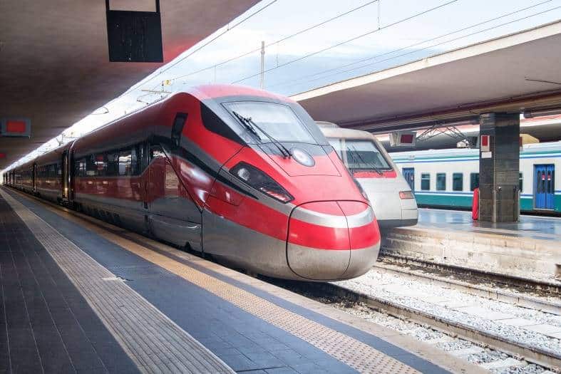 A train in Italy waiting for families on vacation with teens