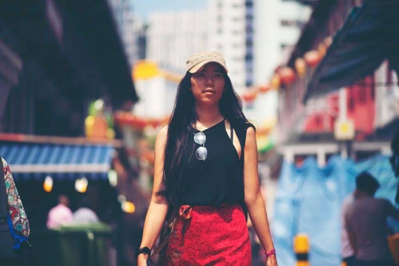 a young lady strolling the shopping area of stockholm