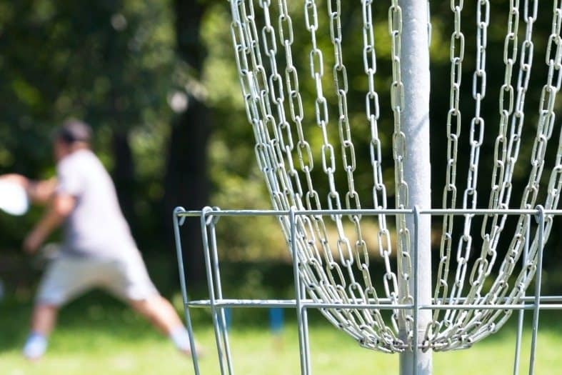 a person playing disc golf