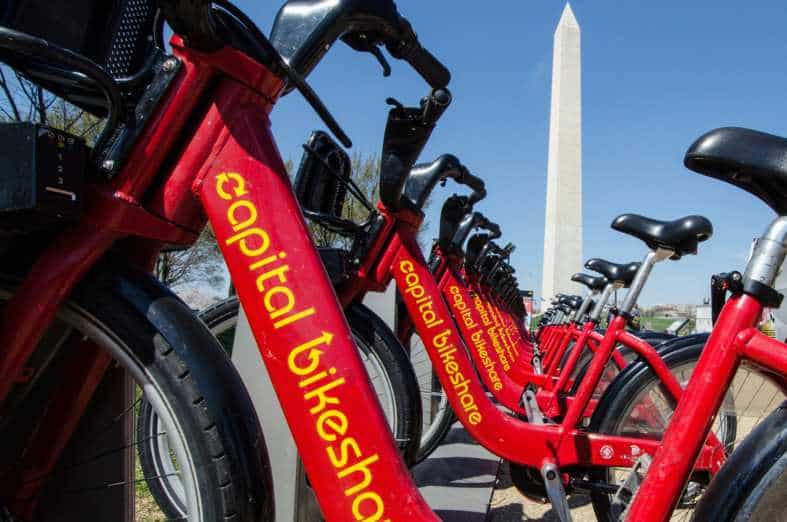 red bikes that are part of a bike share proigram in washington d.c