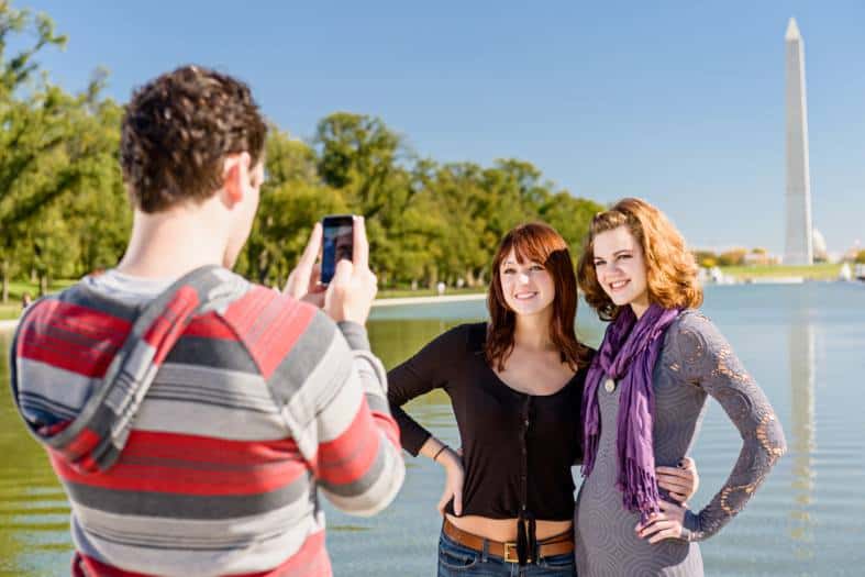 2 teenage girls in Washington Dc getting their pictures taken