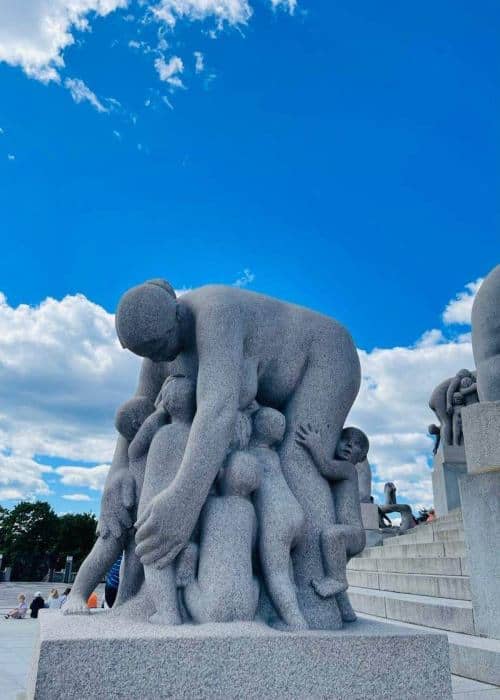 Sculpture of a mother embracing children in Vigeland Park, Oslo