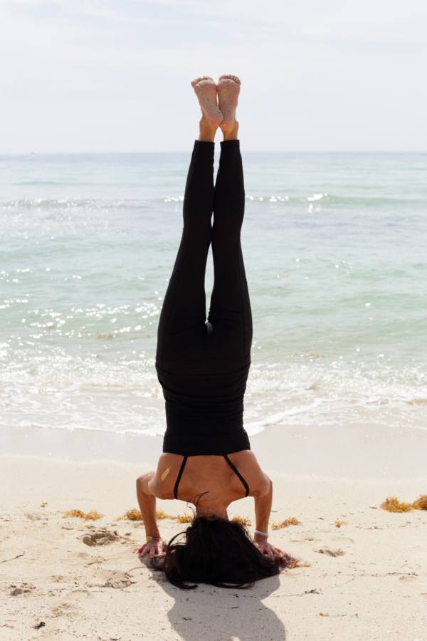 Doing Yoga on Miami beach