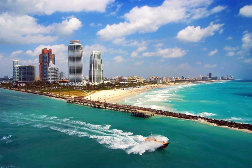 a high speed boats going along the coast at Miami Florida