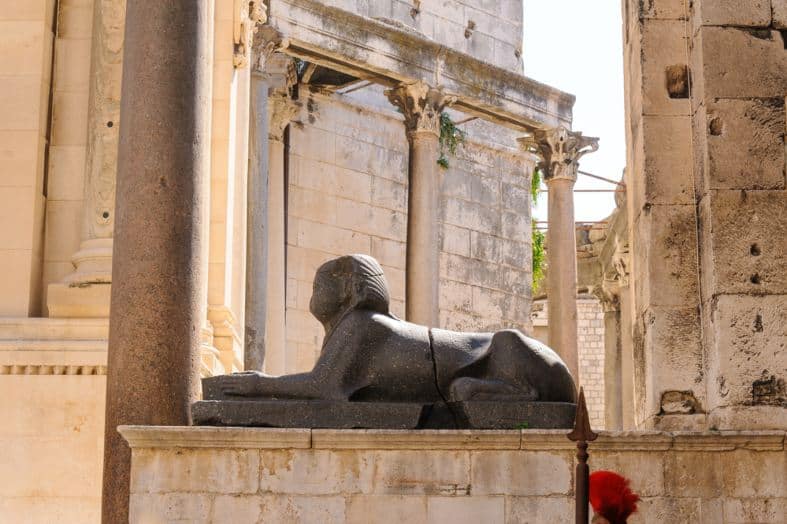 A sphinx from egypt that now lives in split old town on a wall near the church