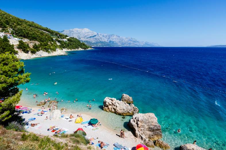 blue water and white sand beach in split