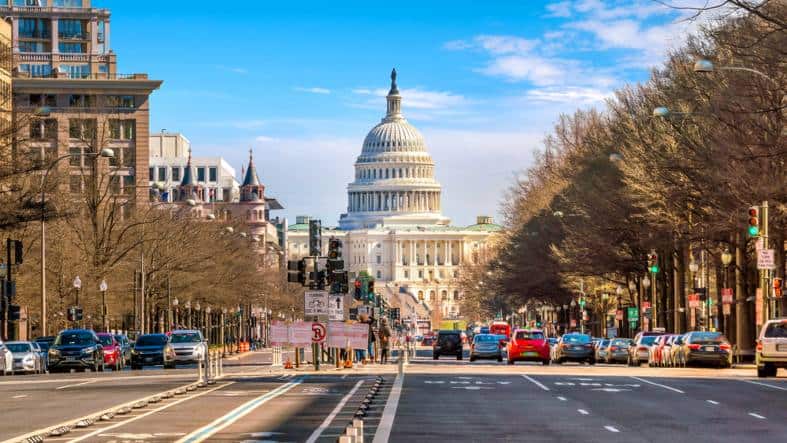 A view of the capital building from the street leading up to it