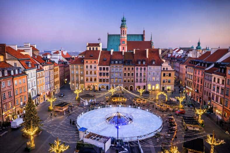 In a sqaure of the old town market stalls and ice skating rink in warsaw