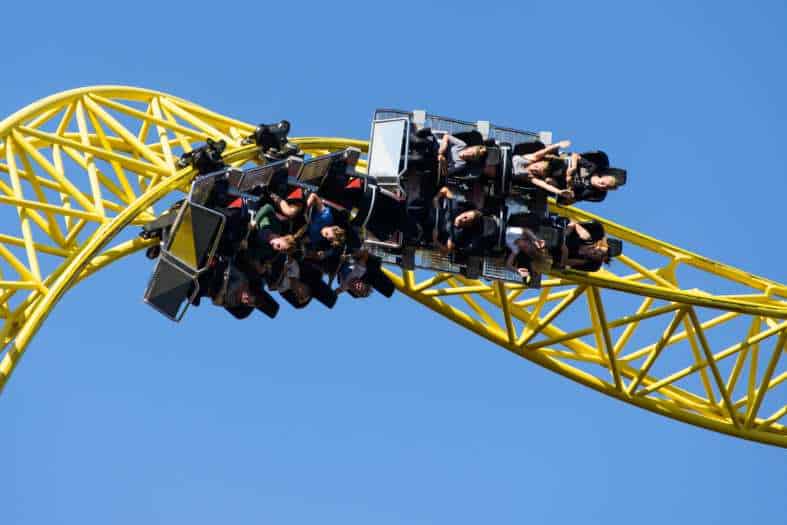 teenagers and adults in helsinki on a twistting rollercoaster