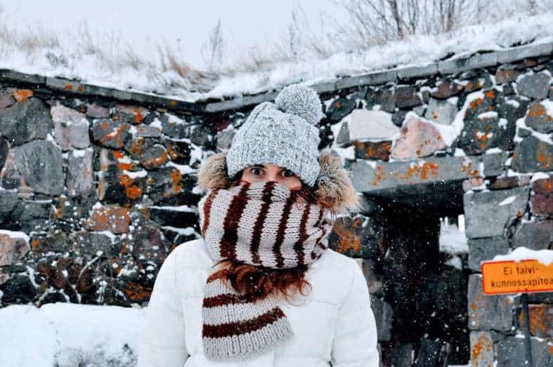 a teenage girl in Helsinki rugged up in Winter time