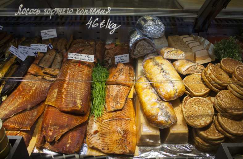 Different types of food you see on a food tour in Helsinki including smoked fish