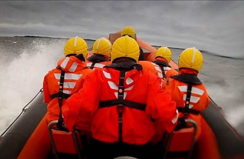 Having fun crossing waves on a rigid inflatable boat near helsinki
