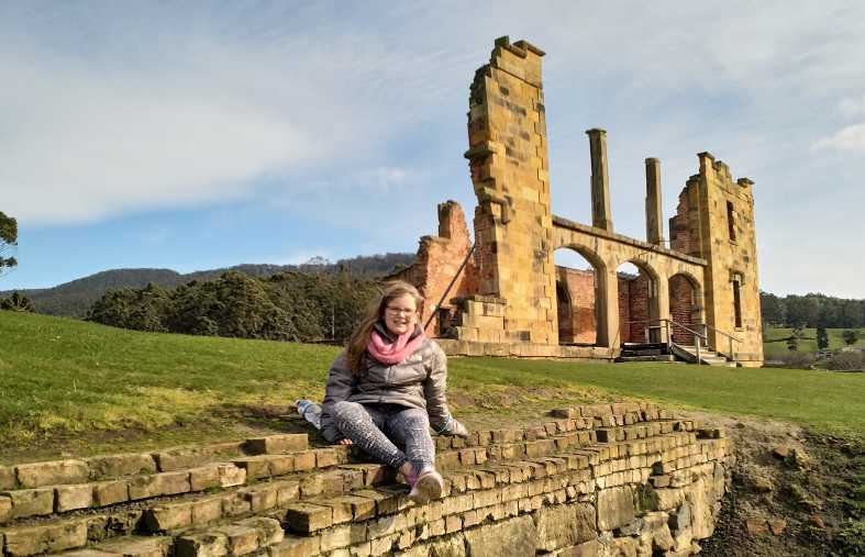 ateenage girl exploring the convict ruins of Port Arthur