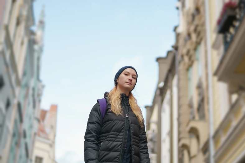 a teenage girl in the streets of Tallinn Estonia