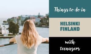 a young lady looking at harbour area of helsinki