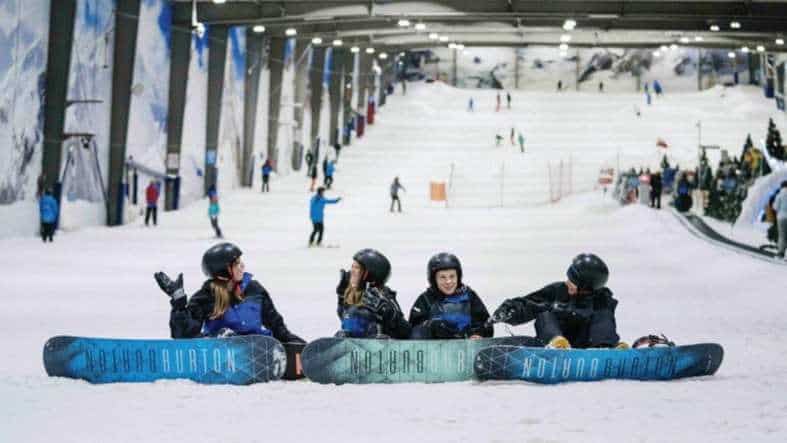 teenagers having fun snowboarding at an indoor centre in Auckland New Zealand