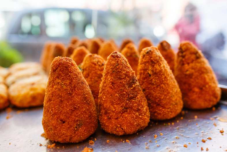 Arancini Ballis in Italy, Rice balls that are crumbed with filling inside