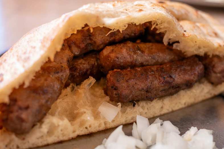 Small sausages from the balkans in bread