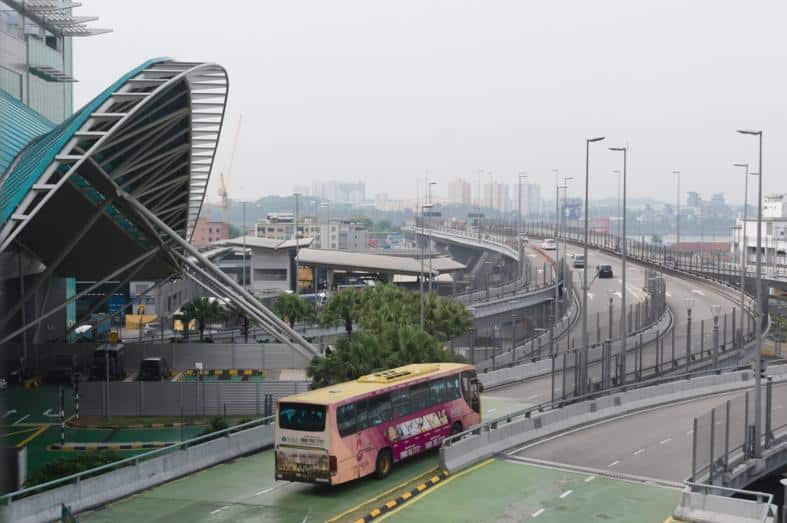 a bus crossing the border from Malaysia into Singapore