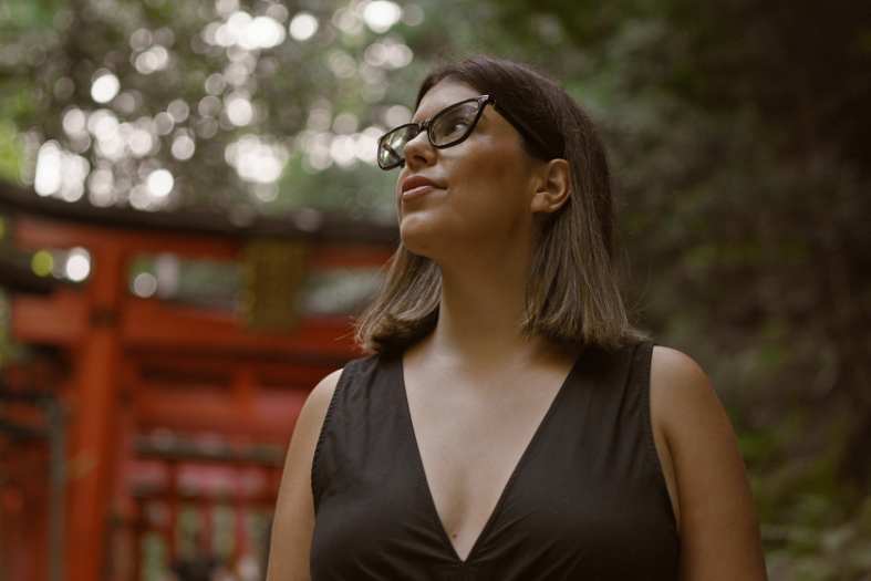 a young adult visiting the Fushimi shrine