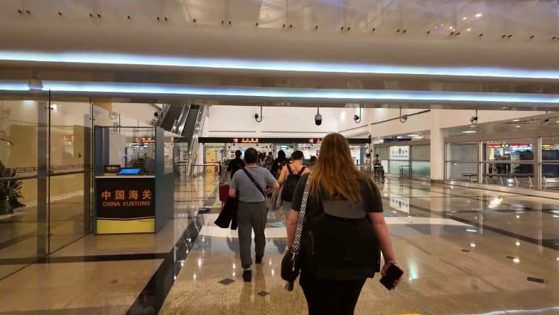 a girl appraoching immigration at Xiamen Airport in China