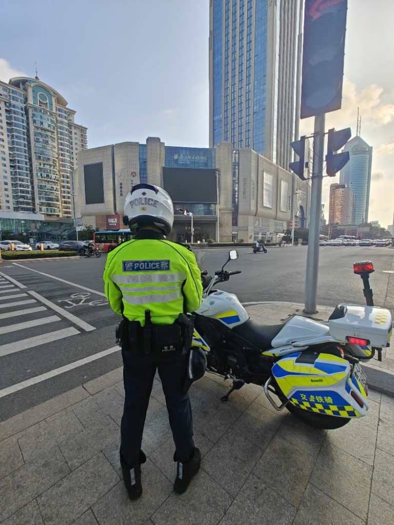 a police officer watching the roads in Qingdao