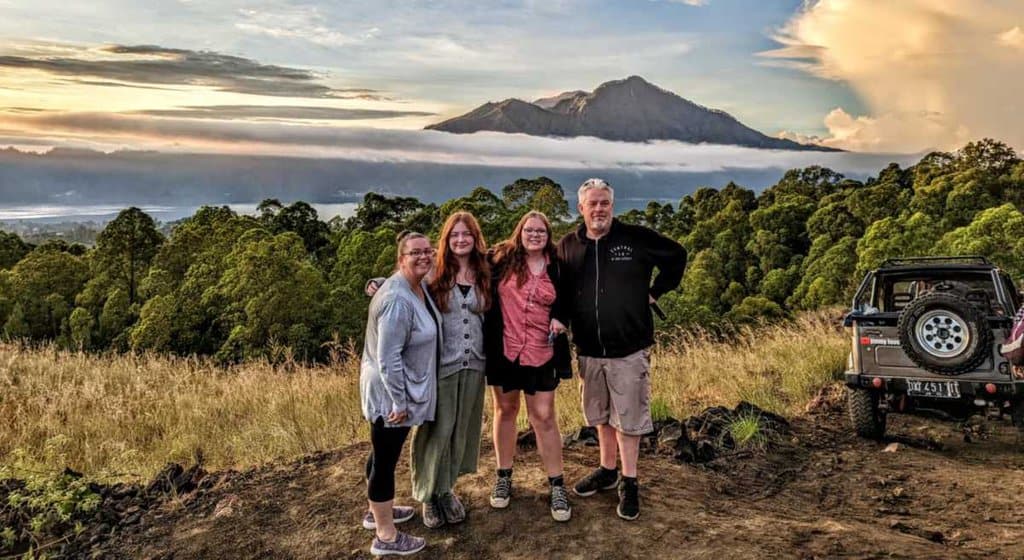 a family on the slopes of Mt Batur in Indonesia