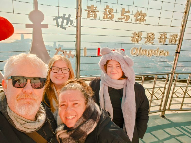 standing on the open deck at the Qingdao Tv Tower