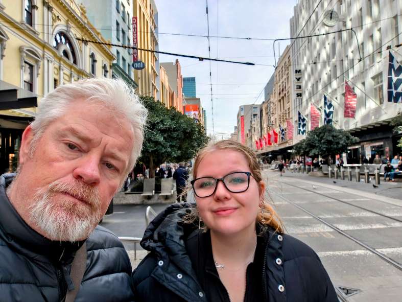 a father and daughter in the Bourke Street Mall in Melbourne