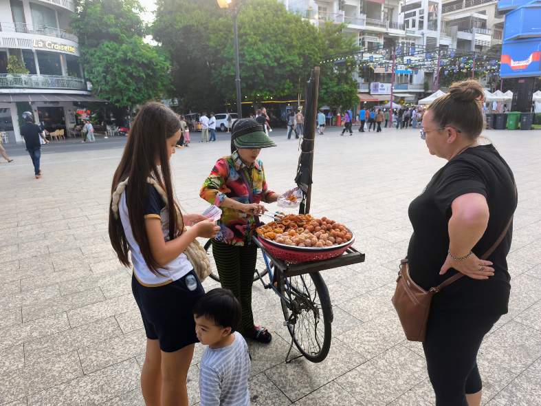 buying street food in Phnom Penh